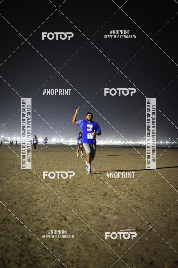 Buy your photos of the eventJovem Pan Night Run Santos on Fotop