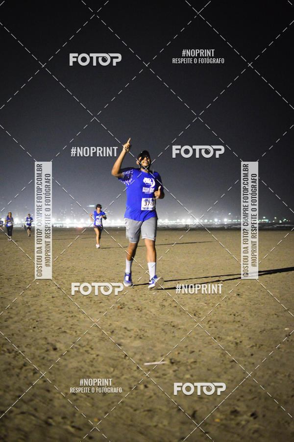 Buy your photos of the eventJovem Pan Night Run Santos on Fotop