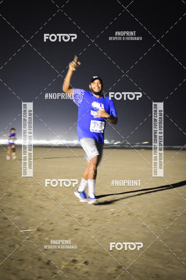 Buy your photos of the eventJovem Pan Night Run Santos on Fotop