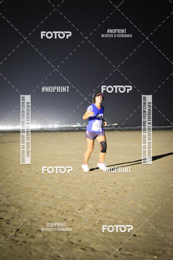Buy your photos of the eventJovem Pan Night Run Santos on Fotop