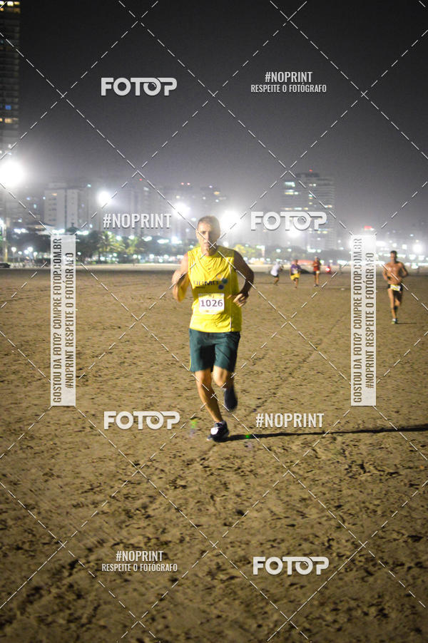 Buy your photos of the eventJovem Pan Night Run Santos on Fotop