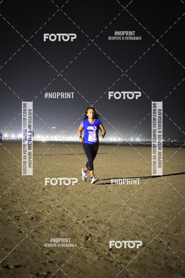Buy your photos of the eventJovem Pan Night Run Santos on Fotop