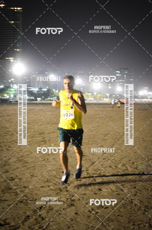 Buy your photos of the eventJovem Pan Night Run Santos on Fotop
