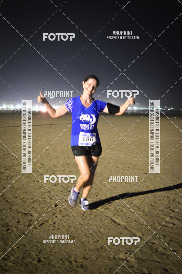 Buy your photos of the eventJovem Pan Night Run Santos on Fotop