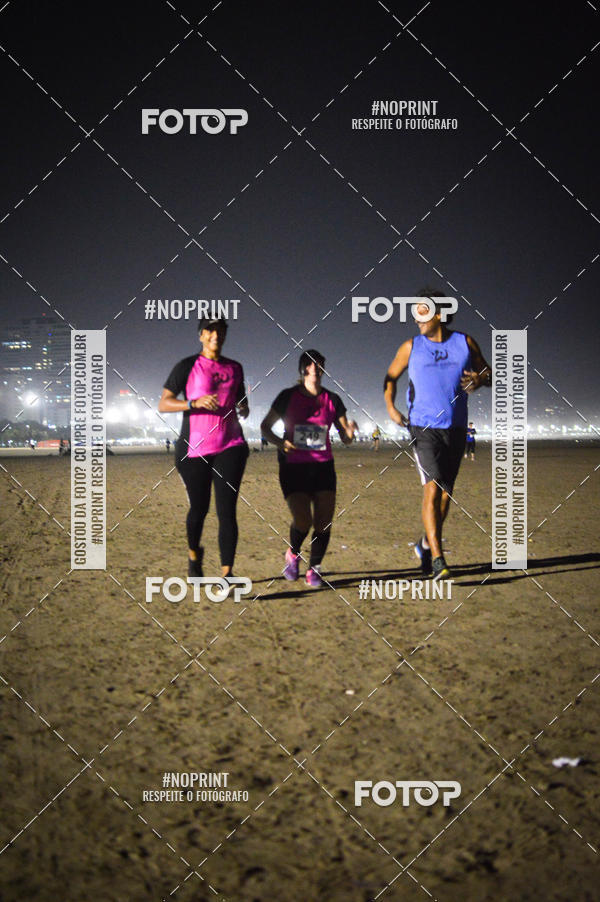 Buy your photos of the eventJovem Pan Night Run Santos on Fotop