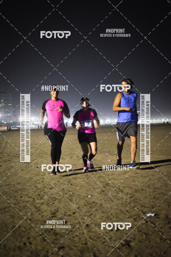 Buy your photos of the eventJovem Pan Night Run Santos on Fotop