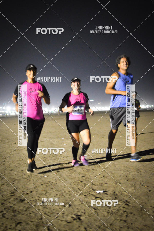Buy your photos of the eventJovem Pan Night Run Santos on Fotop