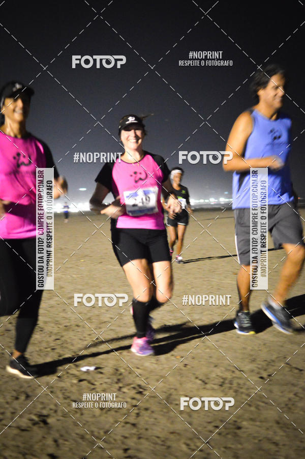 Buy your photos of the eventJovem Pan Night Run Santos on Fotop