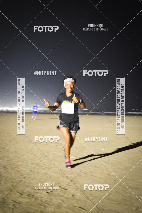 Buy your photos of the eventJovem Pan Night Run Santos on Fotop