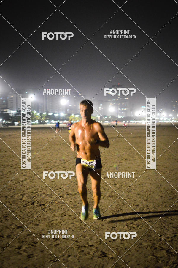 Buy your photos of the eventJovem Pan Night Run Santos on Fotop