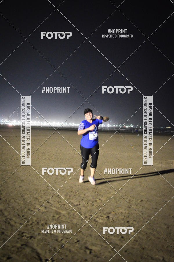 Buy your photos of the eventJovem Pan Night Run Santos on Fotop