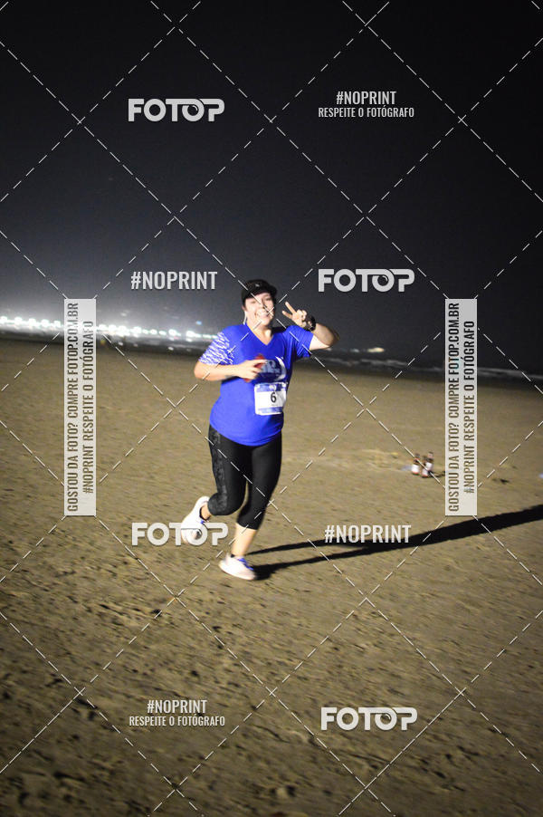 Buy your photos of the eventJovem Pan Night Run Santos on Fotop