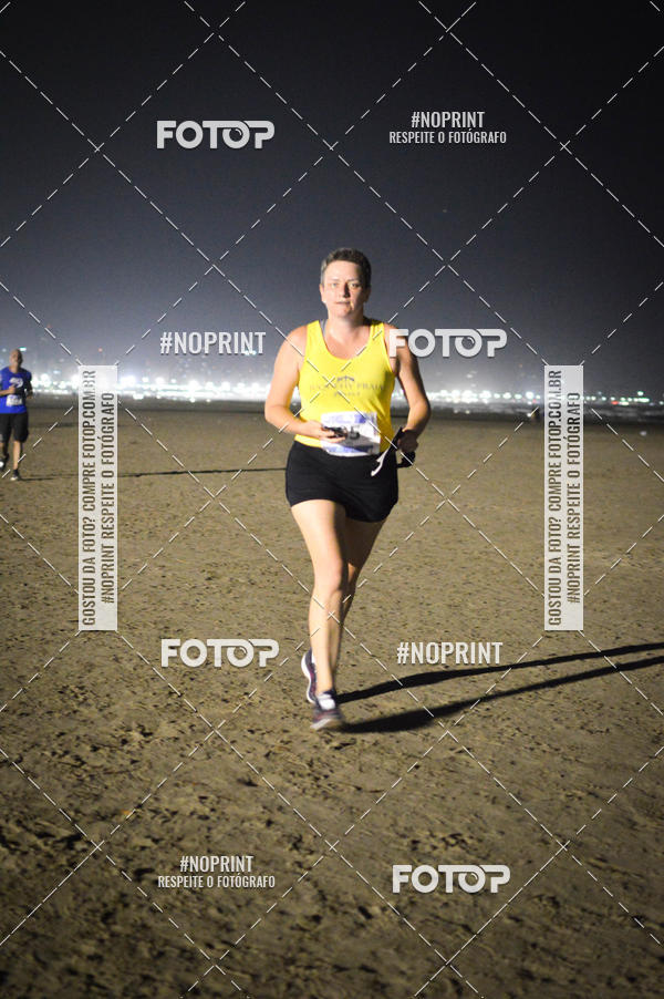 Buy your photos of the eventJovem Pan Night Run Santos on Fotop