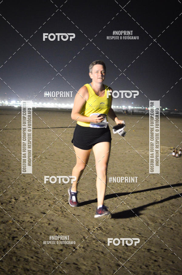 Buy your photos of the eventJovem Pan Night Run Santos on Fotop