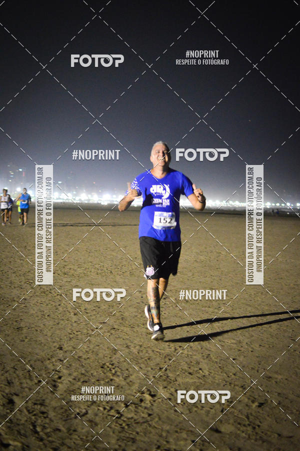 Buy your photos of the eventJovem Pan Night Run Santos on Fotop