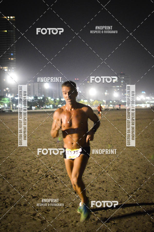 Buy your photos of the eventJovem Pan Night Run Santos on Fotop