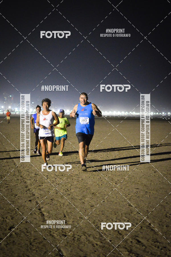 Buy your photos of the eventJovem Pan Night Run Santos on Fotop