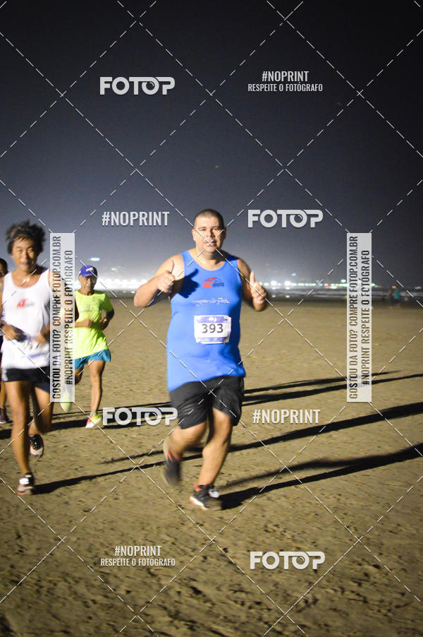 Buy your photos of the eventJovem Pan Night Run Santos on Fotop