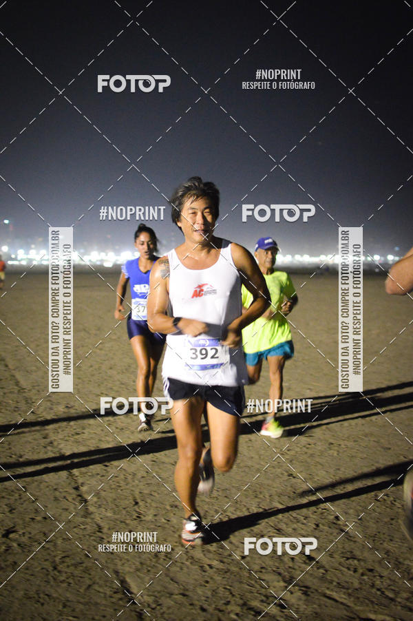 Buy your photos of the eventJovem Pan Night Run Santos on Fotop