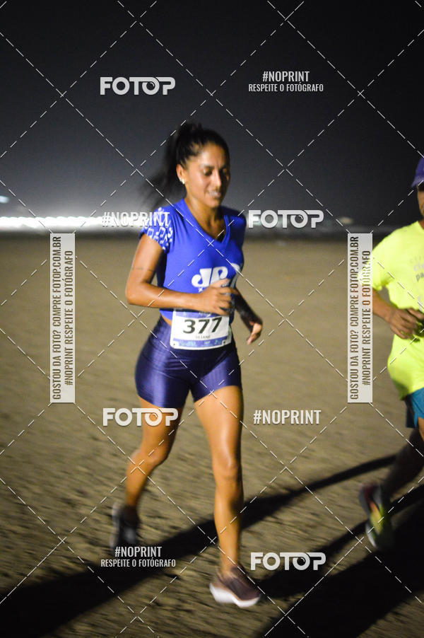 Buy your photos of the eventJovem Pan Night Run Santos on Fotop