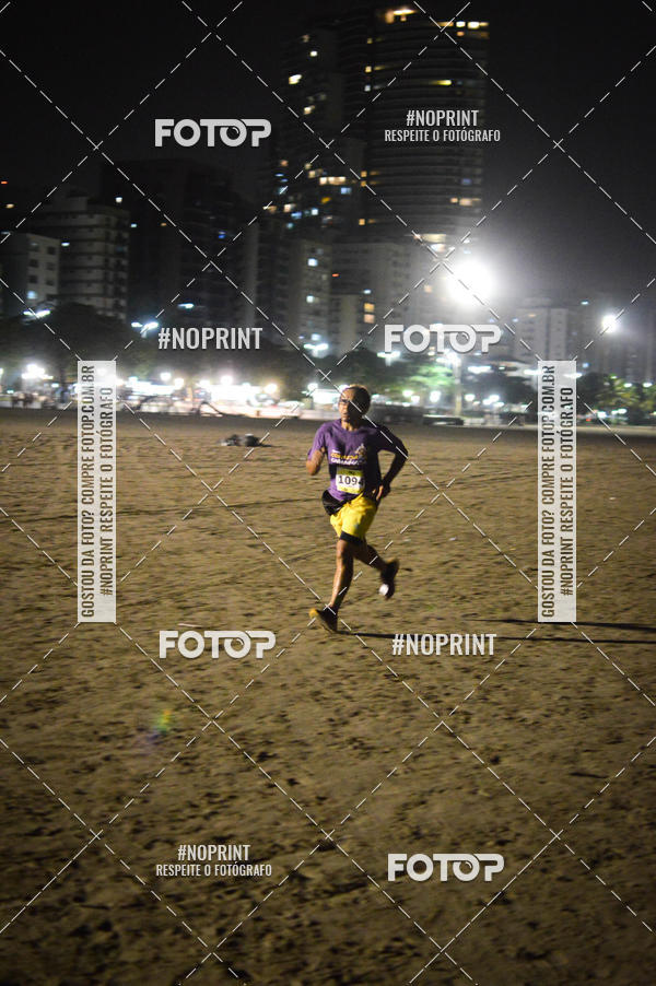 Buy your photos of the eventJovem Pan Night Run Santos on Fotop