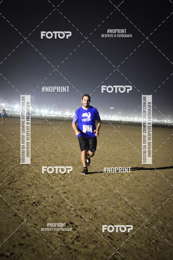 Buy your photos of the eventJovem Pan Night Run Santos on Fotop