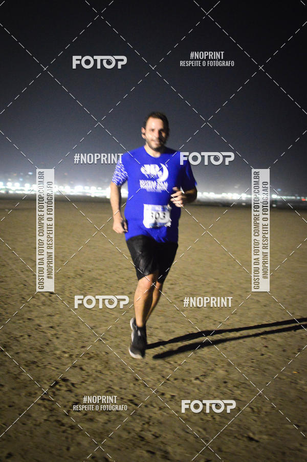 Buy your photos of the eventJovem Pan Night Run Santos on Fotop