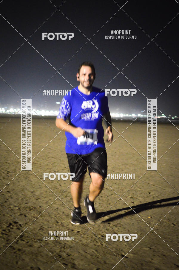 Buy your photos of the eventJovem Pan Night Run Santos on Fotop
