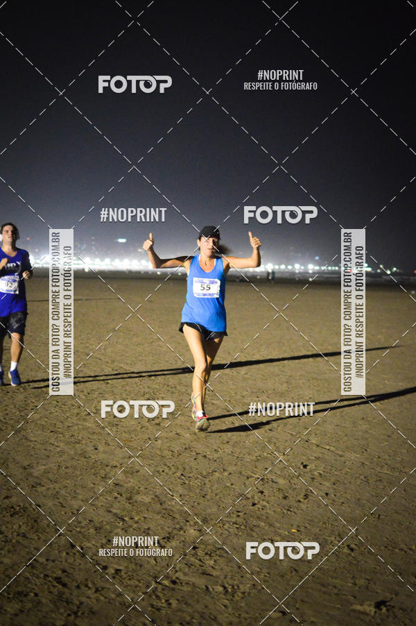 Buy your photos of the eventJovem Pan Night Run Santos on Fotop