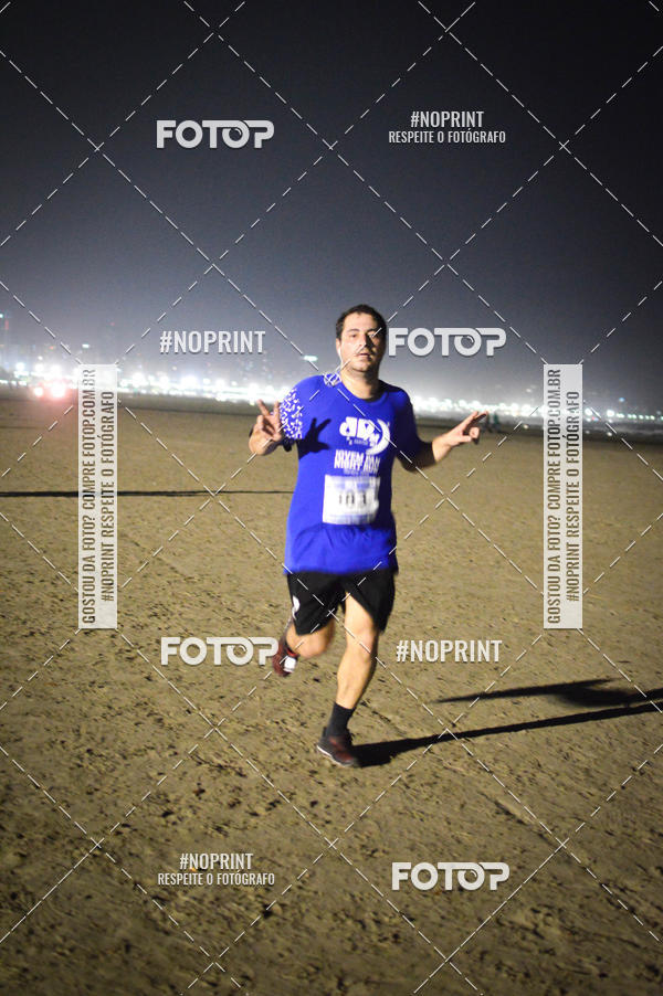 Buy your photos of the eventJovem Pan Night Run Santos on Fotop