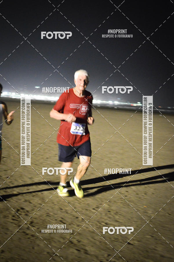 Buy your photos of the eventJovem Pan Night Run Santos on Fotop