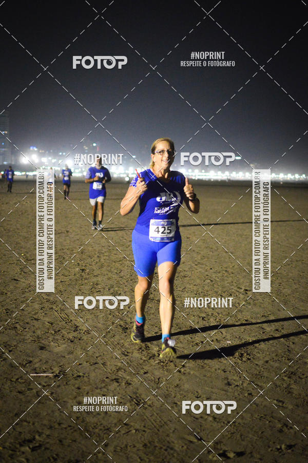 Buy your photos of the eventJovem Pan Night Run Santos on Fotop