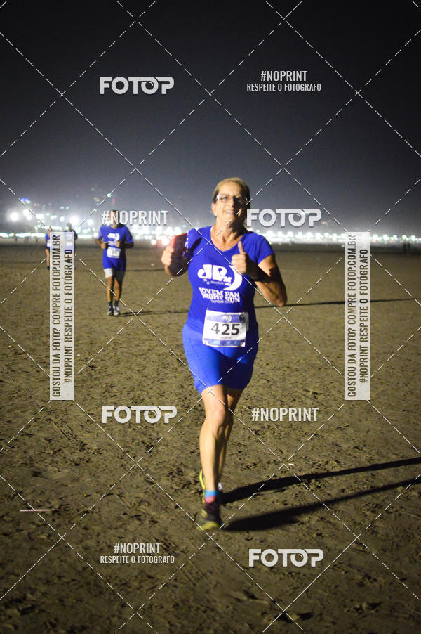 Buy your photos of the eventJovem Pan Night Run Santos on Fotop
