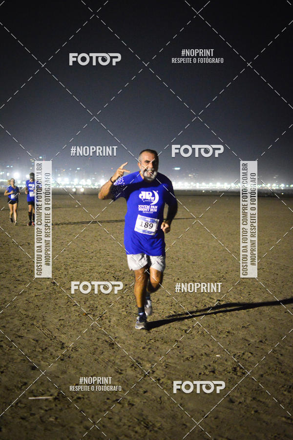 Buy your photos of the eventJovem Pan Night Run Santos on Fotop