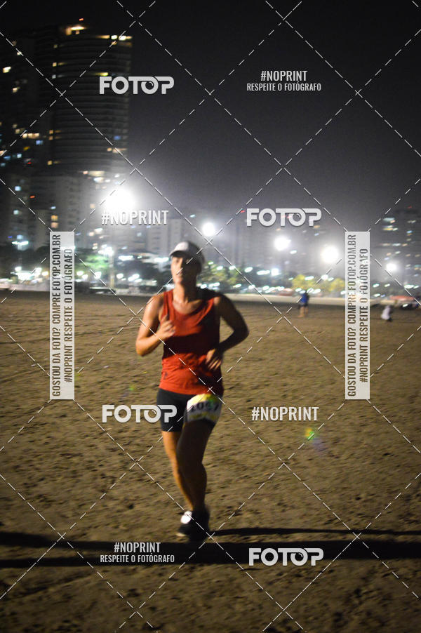 Buy your photos of the eventJovem Pan Night Run Santos on Fotop