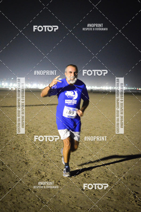 Buy your photos of the eventJovem Pan Night Run Santos on Fotop