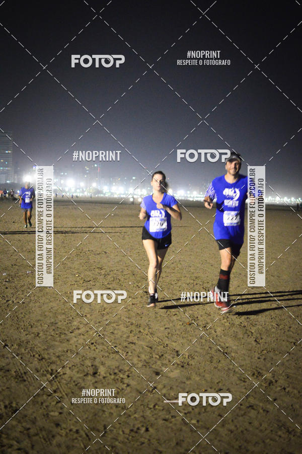 Buy your photos of the eventJovem Pan Night Run Santos on Fotop