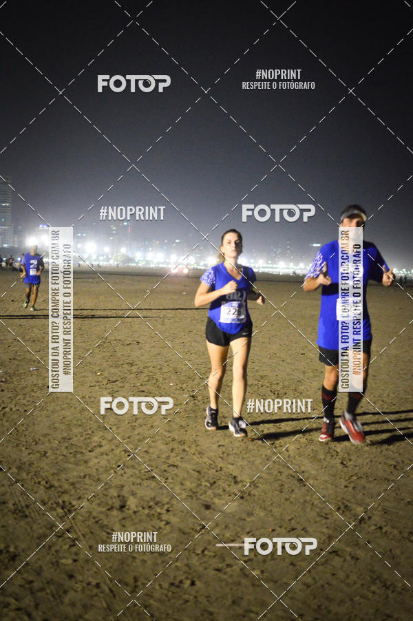 Buy your photos of the eventJovem Pan Night Run Santos on Fotop