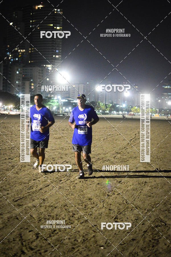 Buy your photos of the eventJovem Pan Night Run Santos on Fotop