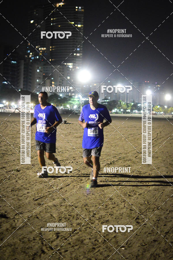 Buy your photos of the eventJovem Pan Night Run Santos on Fotop