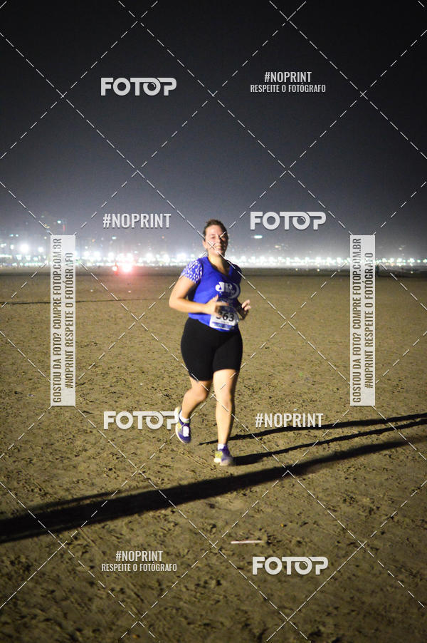 Buy your photos of the eventJovem Pan Night Run Santos on Fotop