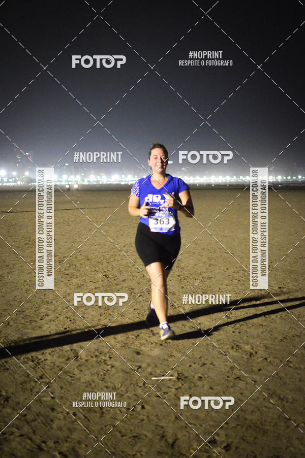 Buy your photos of the eventJovem Pan Night Run Santos on Fotop