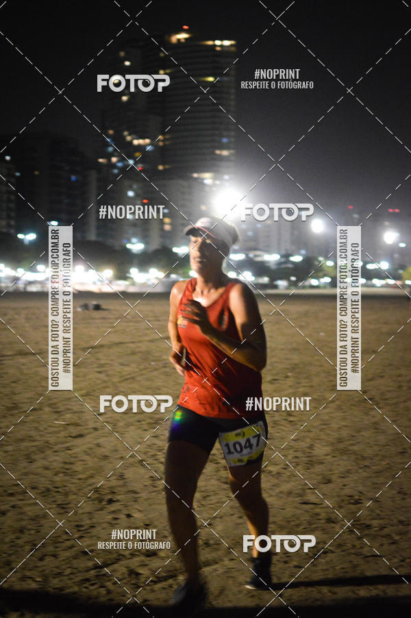 Buy your photos of the eventJovem Pan Night Run Santos on Fotop