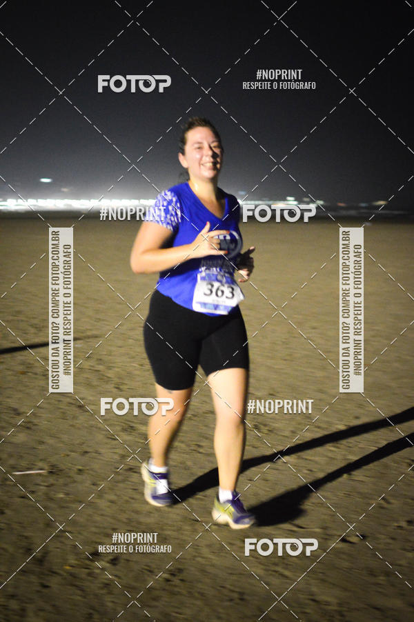 Buy your photos of the eventJovem Pan Night Run Santos on Fotop