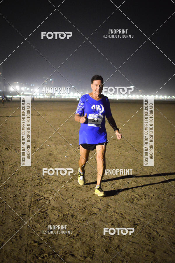 Buy your photos of the eventJovem Pan Night Run Santos on Fotop