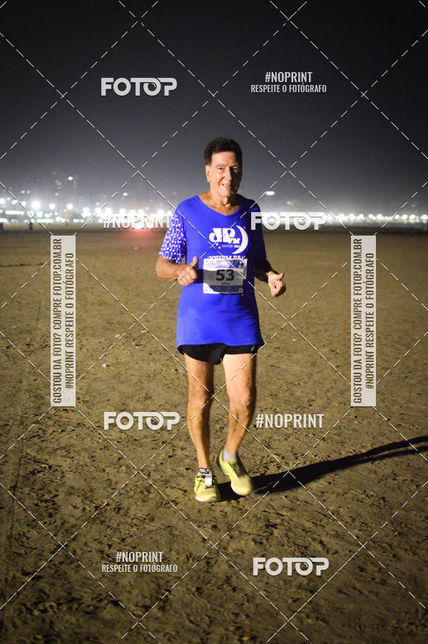 Buy your photos of the eventJovem Pan Night Run Santos on Fotop