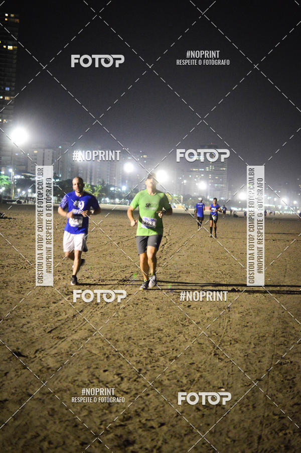 Buy your photos of the eventJovem Pan Night Run Santos on Fotop
