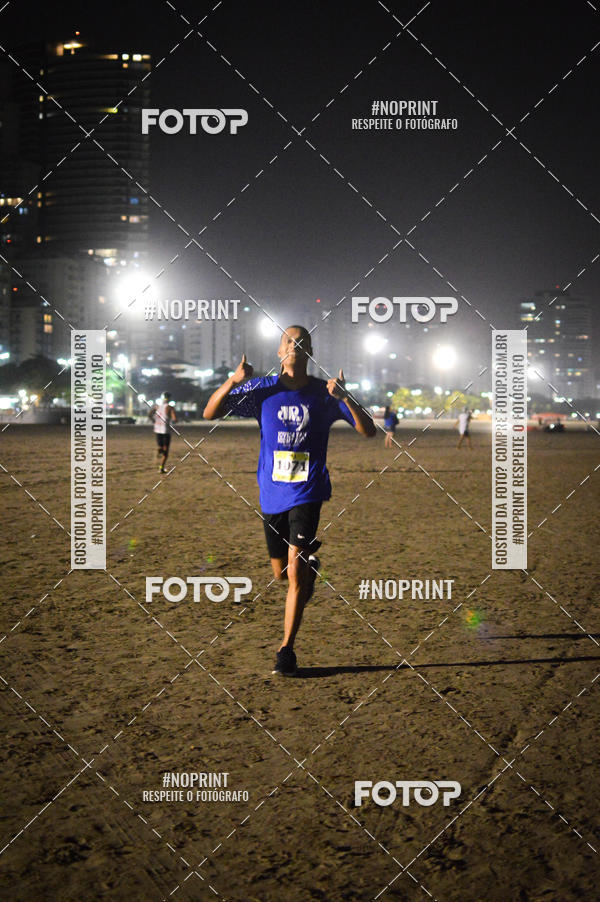 Buy your photos of the eventJovem Pan Night Run Santos on Fotop