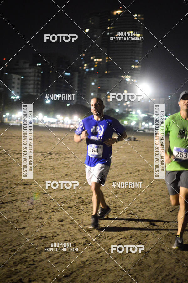 Buy your photos of the eventJovem Pan Night Run Santos on Fotop