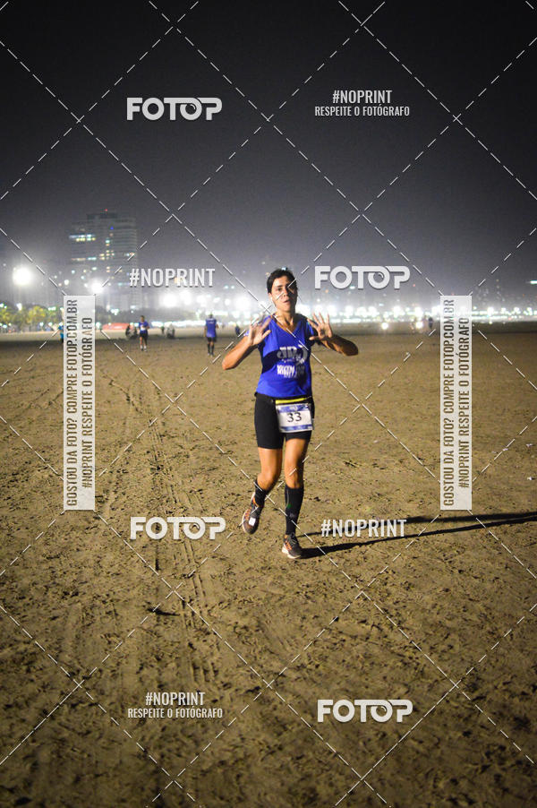 Buy your photos of the eventJovem Pan Night Run Santos on Fotop